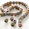 12 Pack: Multicolor Metallic Dotted Rondelle Beads, 4mm by Bead Landing™